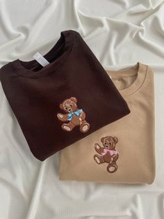 This is a professionally embroidered sweatshirt. 👚MATERIAL 80% cotton 20% polyester ▪️ SIZE  Sizes are unisex. Please check the size chart before you purchase.  💧 CARE:  Machine wash cold, inside-out, gentle cycle with mild detergent and similar colors.   Tumble dry low, or air-dry for longest life. Every item is made to order, creating less fabric waste than conventional manufacturing. Please note that the embroidery comes with a backing that acts as a stabilizer to support the fabric and sti Brown Cotton Sweatshirt With Embroidered Logo, Brown Long Sleeve Sweatshirt With Embroidered Logo, Christmas Sweatshirt Ideas, Teddy Bear Sweater, Womens Sweatshirts, Bow Sweater, Embroidery Hoodie, Sweater Trends, Yellow Sweatshirt