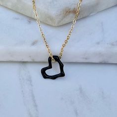 Tiny and Dainty black heart charm is a perfect everyday necklace. *Chain Length:18'  *Material: Stainless Steel chain and charm. *All items are nicely packed ready to gift. * It's best to keep away from chemical products and keep it away from lotion and perfume. Visit my Etsy store: https://etsy.me/3h5E6qy Follow me on Instagram  https://instagram.com/aguadoradadesign?igshid=YmMyMTA2M2Y= Black Adjustable Chain Heart Pendant Jewelry, Elegant Black Heart Pendant Charm Necklace, Black Heart Necklace With Adjustable Chain, Minimalist Black Heart Charm Necklace, Black Necklace With Adjustable Chain For Valentine's Day, Minimalist Black Heart Necklace, Black Heart-shaped Jewelry With Adjustable Chain, Black Charm Necklaces For Valentine's Day, Black Heart Shaped Jewelry With Adjustable Chain