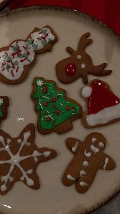 a platter filled with lots of decorated cookies