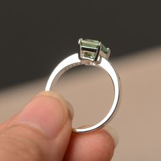 This is a gorgeous handmade creation. Its beauty is its simplicity & Elegance. The 6*8mm emerald cut green sapphire is crafted in solid sterling silver / 14k gold. It is available to customized, if you have any mind, just let me know, we will discuss with it. All item is sent in a beautiful gift box You can realize more lovely stuff clicking the link https://www.etsy.com/shop/knightjewelry?refshopsection_shophome_leftnav Please leave the correct address and you PHONE NUMBER for delivering su Green Sapphire Ring For May Birthstone In Sterling Silver, Green Sapphire Sterling Silver Ring For Wedding, Green Brilliant Cut Emerald Ring In Sterling Silver, Green Diamond-cut Sterling Silver Jewelry, Green Sapphire Ring Sterling Silver, May Birthstone, Emerald Cut Sapphire Ring, Silver Wedding Ring, Green Gemstone Ring, Green Sapphire Ring