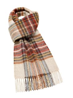 "Otley Rust Scarf Made from 100% Pure Merino Lambswool the finest available species of Lambswool giving a soft and luxurious feel to the product. Seen here is the Otley Rust Scarf Approximate size including fringe 10\" x 75\" (w x l) MADE IN ENGLAND This product is manufactured by Abraham Moon & Sons Ltd who have been producing quality wool products at their mill in Yorkshire, England since 1837. This is one of the last remaining vertical mills in England and it has been operating since the end Teal Scarf, Wool Products, Plain Scarves, Plaid Throw Blanket, Tartan Blanket, Cowl Knitting Pattern, Tartan Scarf, Plaid Throw, Scarf Pattern