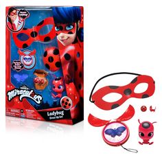 a ladybug mask and eye patch set in a box