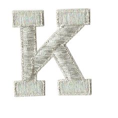 the letter k is made up of silver thread