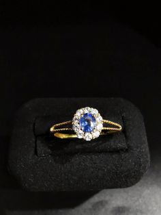 ♥ Gemstone used: Natural Sapphire with cornflower blue, blue, royal blue ♥ Stone size: 4*5 mm ♥ Stone shape: Oval cut ♥ Secondary stone: Zirconia ♥ Material: 925 sterling silver, 18 carat gold plated C A R E ∙ I N S T R U C T I O N S ♥ - Jewelry should be stored separately in an airtight jewelry box. - Avoid direct contact with perfume, body lotions or other chemicals. - Remove jewelry before going to bed or participating in physical activity. - You can easily restore the shine to silver with a polishing cloth or use a polishing lotion for extra shine. Blue Sapphire Ring With Halo Setting In 14k Gold, 14k Gold Blue Sapphire Ring With Halo Setting, Blue Oval Dainty Birthstone Ring, Dainty Blue Oval Rings, 14k Gold Blue Halo Rings, Blue 14k Gold Ring With Halo Design, 14k Gold Blue Sapphire Ring With Halo, Dainty Blue Ring For Formal Occasions, 14k Gold Blue Halo Design Rings