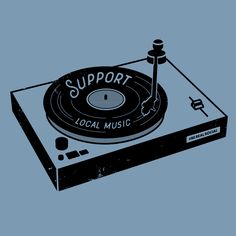 an old record player with the words support on it's side, in front of a blue background