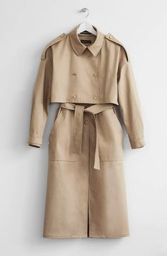 Fabric: 100% CottonColor: NudeCare: Machine Wash Cold/ Tumble Dry Low Two-piece long nude trench coat (44-45 inches (112-115cm long)) with belt and two front pockets. The length of jacket is 16 inches (40-42cm). Unlined. Made in USA. Chic Beige Outerwear With Belted Cuffs, Chic Beige Gabardine Outerwear, Chic Neutral Belted Outerwear, Beige Belted Outerwear With Lapel Collar, Beige Outerwear With Belted Cuffs For Spring, Beige Belted Cuffs Outerwear For Spring, Beige Long Coat With Belted Cuffs, Neutral Belted Outerwear For Work, Chic Khaki Outerwear With Belted Cuffs