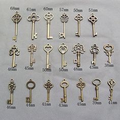 many different types of keys are shown on a sheet with measurements for each key in the image