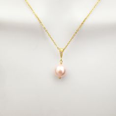 Single Pearl Necklace, Floating Pearl Necklace, White Pearl Necklace, Solo Pearl Necklace Jewelry for Woman, Bridesmaid Wedding Bridal Gift Item details ♪ Color: gold / silver  ♪ Pendant size:  10mm swarovski pearl in white or pink ♪ High quality chain and clasp ♪ 16K shiny gold/ white gold plated over stainless steel  ♪ Necklace length: 17" ♪ Packed individually in a gift box Handmade with Love by Clara ---------------------------------------------- ► Enter shop here : https://www.etsy.com/shop Gold Drop Necklace With Pearl Charm For Wedding, Delicate Gold Necklace For Bridesmaids, Pink Pearl Pendant Jewelry For Wedding, Pink Pearl Charm Jewelry For Wedding, Wedding Pearl Charm Pendant Drop Necklace, Pink Teardrop Pendant Jewelry For Wedding, Delicate Pendant Necklace For Wedding, Gold Necklace With Pearl Drop For Wedding, Wedding Pendant Drop Necklace With Pearl Charm