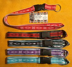 The Sis'łichíí or sash belt is worn as part of traditional Navajo dress. Sash belts are also important to neighboring Pueblo tribes.  This lanyard features a traditional woven design and is a modern way to honor the tradition in everyday life. 1 inch wide and about 18 inches long. Keychain is detachable. Machine woven on a jacquard loom out of polyester thread. Navajo Sash Belt Designs, Navajo Sash Belt, Gingerbread Pillow, Navajo Dress, Long Keychain, Jacquard Loom, Dress Sash, Handmade Jewelry Tutorials, Belt Design