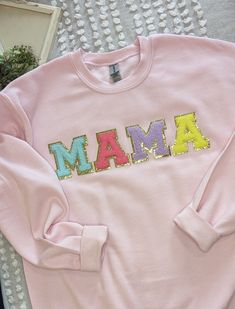 Chenille patch mama sweatshirt, trendy mom patch custom mommy and me, varsity patch letters sweatshirt, new mama to be Mothers Day gift idea  Custom Made to Order Sweatshirt DETAILS : Sweatshirt * adult unisex  * gildan 1800 * cotton 50/50 heavy blend  * made in any color   Letters *3 inch chenille/glitter *set with heat press and sewed on for additional security *Colors picked by me but can request custom colors if available. TAT * 10 - 14 days at most  * if common color is in stock will be made within 3 - 5 days Shipping * priority flat by weight  * not responsible for turn around time of postal service time frame, business or holidays  All orders are non-refundable, items are pulled in the order that it was received and are handmade.  Instructions : - wash inside out  - on cold water se Letter Sweatshirt, Trendy Mom, Glitter Letters, Mama Sweatshirt, Color Pick, Mommy And Me, Custom Made, Sweatshirts Women, Custom Color