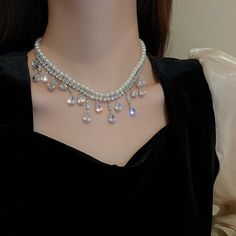 Adorn yourself with the elegant allure of the Coquette Pearl Choker Necklace. This exquisite piece features a delicate, 18-inch chain of lustrous freshwater pearls, perfect for adding a stylish touch of sophistication to your ensemble. Be the envy of all who behold you in this timeless classic. Geometric Crystal, Crystal Choker Necklace, Party Necklace, Earrings Geometric, Pearl Choker Necklace, Crystal Choker, Chain Necklaces, Diamond Drops, Pearl Choker