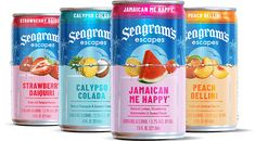 four cans of seagram's escapes tropical melon, strawberry and peach soda