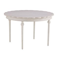 a white table with three legs and a circular top on an isolated white background,