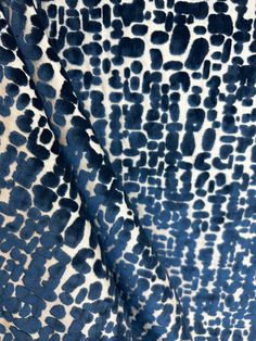 a blue and white animal print fabric