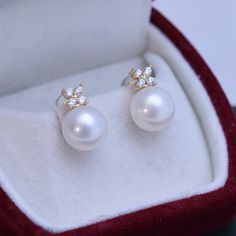 White 10-11mm Freshwater Pearl Shiny Earrings Crafted with 10-11mm purple freshwater pearls, these earrings will be a stand-out in any collection. With a timeless design, you will be able to enjoy these for many years. Perfect for day or evening wear, these earrings make a stunningly beautiful statement and are sure to draw admiring glances. This popular earrings design features AAAA quality, round freshwater pearls measuring 10-11mm. Material: Freshwater Pearl with 925 sterling silver or gold v Exquisite Pearl Earrings For Gifts, Luxury Pearl Pendant Earrings As Gift, Luxury Pearl Earrings With Pearl Charm, Luxury Pearl Charm Earrings As Gift, Luxury Pearl Earrings With Pearl Pendant, Elegant Akoya Pearl Earrings For Gift, Exquisite Round Pearl Earrings, Luxury Pearl White Pearl Earrings, Luxury Akoya Pearl Drop Earrings