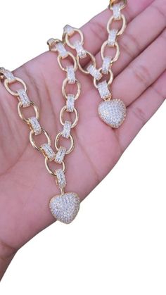 Don't miss this chance to get this stunning gold layered heart necklace With matching bracelet  at a bargain price. This set is a must-have for any jewelry lover, featuring a gold layered necklace with a heart pendant and bracelet with heart-shaped cubic zirconia stones. The cubic zirconia stones are hand set with care and precision, creating a dazzling sparkle that mimics real diamonds. The gold layering adds a layer of elegance and durability to the jewelry, making it last longer and look more expensive. You will love how this set adds a touch of romance and glamour to your look, whether you wear it for a date night, a wedding, or a casual day out. You will feel beautiful and special every time you wear this set, and you will get compliments from everyone who sees it. This set is the per Heart Ring Box, Xoxo Necklace, Gold Layered Necklace, Family Jewelry, Set Bracelet, Latina Fashion, Bracelet Chain, Gold Necklace Set, Girl Friend