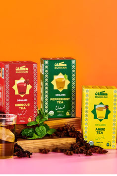 three different types of teas on a pink and orange background with an orange box