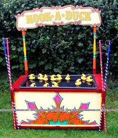 an old fashioned hook - a - duck game in the grass