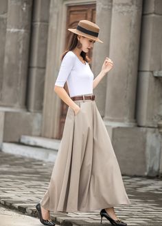 "Get dressed and out of the door in classic good looks with this pleated Long maxi skirt, crafted with soft cotton linen fabric, featuring pleated waist detail and two big pockets. DETAIL * More color https://etsy.me/3fsncV4 * 50% linen, 50% cotton * Has no lining, Not see through * Two pockets * High waistband * Back elastic waistband * Right Side zipper closure * Ankle length * Perfect for spring and summer, autumn * Wash by hand or machine with cold water *The model is 170 cm (5′7″) tall with Elegant Cotton Maxi Skirt, Elegant Full-length Cotton Skirt, Summer Full Length Maxi Skirt For Workwear, Summer Workwear Full-length Maxi Skirt, Summer Workwear Maxi Skirt, Elegant Full Length Solid Color Maxi Skirt, Beige Maxi Length Lined Skirt Bottoms, Elegant Full Maxi Skirt With Pockets, Spring Solid Color Full Length Maxi Skirt