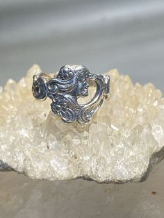 "lady face ring art deco band floral art nouveau sterling silver women Size 6.25 Between a size 6.25 and a size 6.50 Weight. 3.7g Widest 5/8\" Thinnest part of band 1/8\" Free Shipping & Free Postal Insurance Delivered in a Gift Box If you do not want the ring polished and want to leave the natural patina please let me know at the time of purchase as I do polish rings before I ship rings out. Thanks Free First Class shipping and postal insurance is included. If you want to upgrade to priorit Art Nouveau Sterling Silver Gift Rings, Nickel-free Gold Art Nouveau Jewelry, Art Nouveau Nickel-free Jewelry Gift, Nickel-free Art Nouveau Earrings As Gift, Nickel-free Art Nouveau Jewelry Gift, Woman Face, Floral Art, Heart Ring, Statement Rings