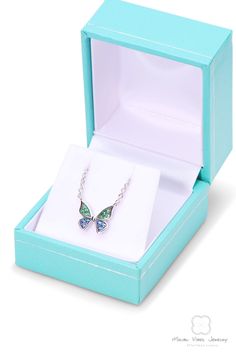 "Solid Sterling Silver Butterfly Necklace, 16 round brilliant cut blue and green cubic zirconia are prong-set on this dainty butterfly design. The Sterling Silver 16\" cable link chain has a 1.5\" extension so you can adjust the length. Aim straight to her heart with this on-trend butterfly necklace. Crafted in sterling silver, this gleaming butterfly design is centered along a glistening cable chain. Buffed to a brilliant luster, 16-inch necklace secures with a spring clasp. ALSO AVAILABLE MATC Giraffe Earrings, Giraffe Jewelry, Silver Butterfly Necklace, Giraffe Necklace, Dainty Butterfly, 16 Inch Necklace, Heart Pendant Gold, Rose Gold Heart, Graduation Gifts For Her