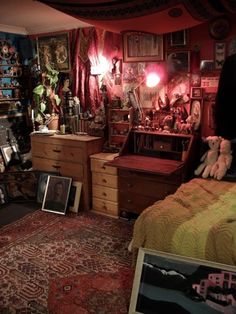 a bedroom filled with lots of furniture and pictures