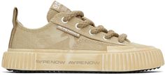 Low-top canvas sneakers in beige. · Graphics coated throughout · Rubber cap toe · Lace-up closure · Logo patch at tongue · Logo flag at outer side · Logo-bonded pull-loop at heel collar · Canvas lining · Logo printed at textured rubber midsole · Treaded rubber sole Supplier color: Beige Beige Sneakers With Logo Patch For Streetwear, Beige Canvas Sneakers For Streetwear, Khaki Low-top Sneakers With Vulcanized Sole, Beige Cotton Canvas Shoes With Vulcanized Sole, Khaki Sneakers For Streetwear With Vulcanized Sole, Khaki Sneakers With Vulcanized Sole For Streetwear, Beige Canvas Shoes With Rubber Sole For Streetwear, Beige Cotton Low-top Canvas Shoes, Beige Sporty Sneakers With Rubber Toe Cap