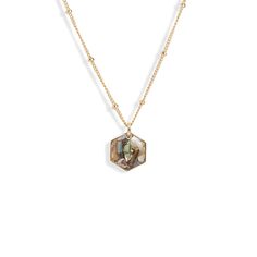 This beautiful Abalone Necklace is an iridescent eye-catcher. Each crystal is handcrafted, making it as unique as every individual. The crystal showcases a glass-like resin filled with crushed Abalone shell chips. Metal: Gold plated brass crystal frame. Chain is made of 14k gold filled Style: 10mm hexagon pendant, two chain options Size: 17 inches long Hexagon Pendant, Crystal Frame, Hexagon Necklace, Abalone Necklace, Crushed Stone, Gem Necklace, Everyday Basics, Bracelet Collection, Abalone Shell