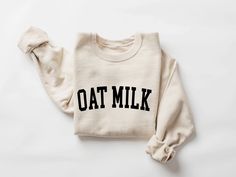 Vegan Oat Milk sweatshirt, Vegan sweater, Oat Milk shirt, Plant Based Foodie Vegetarian Shirt, Oat milk coffee lover shirt, Gift for Vegan Welcome to Bee Design Gifts If you are looking for soft, comfy, first-rate sweatshirts, you're in the right place! I love what I do and strive to make your shopping experience just right for you. If you have any questions, concerns or comments about my products, feel free to send a message anytime. ⭐ 50% cotton, 50% polyester ⭐ Pre-shrunk ⭐Classic fit ⭐ 1x1 athletic rib knit collar with spandex ⭐ Air-jet spun yarn with a soft feel and reduced pilling ⭐Double-needle stitched collar, shoulders, armholes, cuffs, and hem HOW TO PLACE ORDER 1. Check photos for size chart, model comparison and color options 2. Select size and color from the drop down options Casual Oatmeal Fall Tops, Casual Oatmeal Tops For Fall, Casual Long Sleeve Oatmeal Tops, Casual Long Sleeve Oatmeal Sweater, Oat Milk Coffee, Milk Coffee, Oat Milk, Bee Design, Look Plus