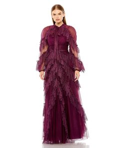 Mac Duggal High Neckline Long illusion sleeves Ruffle detail Approx. 62.5" from top of shoulder to bottom hem Fully lined through body Available in Burgundy Style #11731 Evening Gown With Ruffles And Long Sleeves, Long Sleeve Ruffled Gown For Gala, Fitted Long Sleeve Gown With Ruffles, Destination Wedding Guest Dress, Fall Formal Dresses, Net Gown, Illusion Sleeves, Net Gowns, Spring Wedding Guest Dress