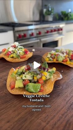 three tortilla shells with veggie ceviche and avocado on them