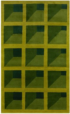 a green rug with squares and rectangles on the bottom in various shades of green