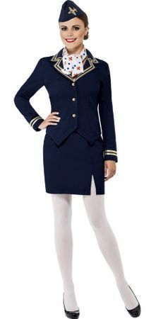 a woman in an air hostess uniform posing for the camera