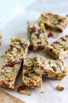 granola bars cut into squares and stacked on top of each other