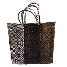 Oaxaca tote Bag, Handmade Mexican Bag, Getaways bag, Travel Bag, Basket, Beach Bag,vegan bag ,Plastic Woven, Oaxaca Bag, recycled plasticThe specifics are impressive: the bag is woven from a heavy duty, pliable plastic that is near indestructible. The weave is so tight, the bag is waterproof, which alone makes it uniqueApproximate measurements.13 1/2 x 12Please note, since this piece is made by hand there may be some imperfections. Instead of viewing this as a mistake, let it add character to th Recyclable Brown Tote Bag, Eco-friendly Recyclable Brown Bag, Brown Recyclable Bags For Daily Use, Rectangular Straw Gift Bag For Market, Woven Tote Bag Made From Recycled Plastic, Handwoven Rectangular Beach Bag For Daily Use, Large Handwoven Bags For Market, Eco-friendly Square Handwoven Bag, Handmade Beach Bag From Recycled Plastic Bottles