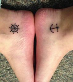 two people with small tattoos on their feet, one has an anchor and the other has a ship wheel