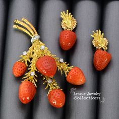 Rare beautiful large natural coral branch vintage brooch set with white round diamonds in 18k yellow gold! Brooch Information: -Weight: 20.5 grams -Precious Metal: 18k yellow gold Precious stones: -Coral Strawberries: 13.6mmx11.7mm to 11mmx7.6mm -Diamonds: 0.375 carats Hallmark: 18k Earring Information: -0.8 inch long (stud style) -Total Weight: 6.5 grams -Precious Metal: 18k yellow gold Precious Stones: -Coral: 12mmx10mm Elegant Orange Brooch Jewelry, Elegant Orange Brooches For Gifts, Strawberry Jewelry, Strawberry Delight, Red Spinel, Stud Style, Mother Of Pearl Necklace, Natural Coral, Gold Brooches