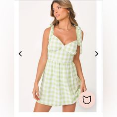 Size M Nwt!! Tried On Once Tea Time Mini Dress White And Green Gingham Print Dress Mini Length Fully Adjustable Shoulder Tie Straps Sweetheart Neckline Seemed In Bust Cups With Sheering At Under Bust Smocked Back Bodice Panel Sheered In Skirt Fulling Lined No Hardware Cute Kittenish Dress By Jessie James Decker Green Summer Mini Dress For Picnic, Chic Green Mini Dress For Picnic, Casual Green Mini Dress For Picnic, Summer Plaid Dress For Garden Party, Cute Summer Plaid Mini Dress, Cute Plaid Mini Dress For Spring, Summer Plaid Dress For Brunch, Cute Fitted Summer Plaid Dress, Green Cotton Mini Dress For Picnic