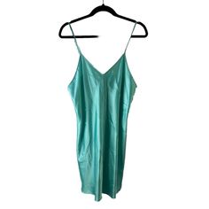 Vintage Slip Nightgown Womens Slip Comes From A Smoke Free, Pet Friendly Home Womens Large Brand New With Tags Photos Are Part Of The Items Description Measurements Are: 19.5 Inches Underarm To Underarm 38 Inches From Top To Bottom Teal Blue Polyester Check Out My Other Items In My Store! Aoap Satin V-neck Bedtime Dress, Satin V-neck Mini Dress For Sleep, Green V-neck Slip Dress For Daywear, V-neck Slip Dress For Spring Sleepover, Satin V-neck Nightgown For Loungewear, Spring V-neck Nightgown, Summer V-neck Slip Dress For Bedtime, Green V-neck Sleepwear, Green Summer Sleepwear For Night