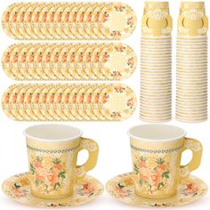 a set of twelve tea cups and saucers with matching plates in the shape of roses