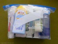 the contents of a travel toiletries bag are neatly packed and ready to be used