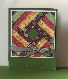 a close up of a card with a bow on the front and back of it