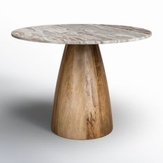 a round marble table with wooden base on an isolated white background for use in interior design