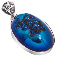 925 Sterling Silver Oval Cobalt Blue Titanium Druzy Agate Sterling Pendant, 1 7/8"    Bail Size:  4mm Silver Type:  Solid 925 Sterling silver Pendant Size:  47x25mm(1 7/8x1") incl bail Pendant Material:  Cobalt blue titanium druzy agate  Note:  No guesswork! You receive the actual piece pictured. Blue Oval Sterling Silver Gemstones, Blue Oval Agate Jewelry, Oval Blue Agate Jewelry, Blue Oval Cabochon Nickel-free Jewelry, Blue Nickel-free Oval Cabochon Jewelry, Nickel-free Blue Oval Cabochon Jewelry, Blue Oval Cabochon Gemstones For Gifts, Blue Oval Cabochon Jewelry, Oval Blue Cabochon Jewelry