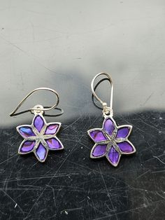 Really pretty, 8mm across, hypoallergenic drop earrings. Produced by a now dissolved company called iceBronze in the period between 2011 and 2018. I stocked these in my online shop for many years and they sold well. Selling off the remaining stock on here. Lovely rich purple colour. The earwires are solid sterling silver. Purple Flower Earrings With Ear Wire For Gift, Purple Flower Earrings With Ear Wire As Gift, Adjustable Purple Flower Earrings For Gift, Adjustable Purple Flower Earrings As Gift, Nickel-free Purple Drop Flower Earrings, Purple Nickel-free Drop Flower Earrings, Purple Flower Charm Earrings, Purple Dangle Flower Earrings, Purple Flower Shaped Earrings