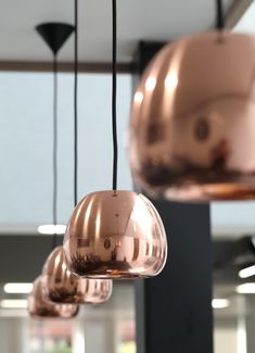 Close up shot of copper pendulum lights. Vintage Copper Lights, Glass And Copper Pendant Lights, Industrial Copper Pendant Lights, Copper Drop Lights, Pendent Lighting Copper