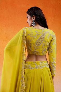 Featuring a daisy yellow lehenga set in georgette base with threadwork, cutdana and moti hand embroidery. It is paired with a matching embroidered georgette blouse and an organza dupatta. Hand Embroidery Daisy, Embroidery Daisy, Lehenga Pattern, Daisy Yellow, Georgette Lehenga, Lehenga Suit, Yellow Lehenga, Embroidered Lehenga, Georgette Blouse