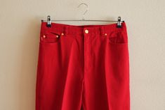 "Ralph Lauren Pants Red Pants Red Women's Pants Red Denim Pants Denim Trousers Red Ralph Lauren Denim Pants Jeans Pants High Waist Shown on model M/L Label size: 12 Measurements(lying flat): Waist: 16.5\"/ 42 cm Length: 41\"/ 104 cm Inseam: 29.5\"/ 75 cm From crotch to waist line: 12\"/ 30.5 cm Hips: ~20.5\"/ 52 cm Condition: Great Vintage Condition Material: 99% cotton,1% lycra Please check measurements to insure a proper fit. Remember to allow yourself some extra room for movement. You can com Red Full-length Jeans For Spring, Red Mid-rise Jeans With Five Pockets, Red Mid-rise Jeans, Red High-waisted Jeans For Spring, Red High Rise Jeans With Five Pockets, Red Cotton Jeans, Red High-rise Jeans, Red High-waisted Pants With Belt Loops, Retro Red Cotton Bottoms