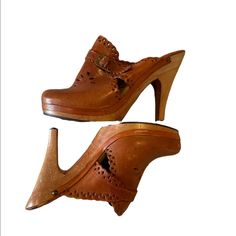 1970's Vintage Vintage Wedge Clogs In Amazing Condition. Please Buy These Before I Change My Mind And Keep Them! Chataigne Leather With Beautiful Wooden Heel. Great Vintage Condition. Perfect For Summer Or Fall ! Retro Closed Toe Leather Mules, Retro Leather Closed Toe Mules, Retro Brown Clogs For Spring, Vintage Clogs With Stacked Heel For Spring, Vintage Leather Sole Clogs For Spring, Retro Closed Toe Mules With Wooden Heel, Retro Mules With Stacked Heel And Round Toe, Retro Mules With Wooden Heel And Round Toe, Retro Mules With Wooden Heel For Spring