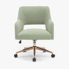 a green office chair with wheels and casteors on an isolated white background, viewed from the front